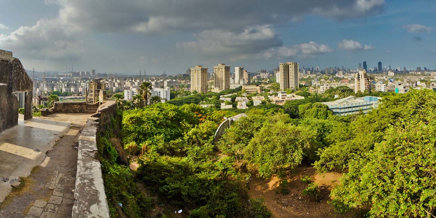 View of Sion Fort, Mumbai, surrounded by greenery and urban landscape.