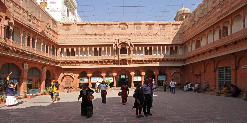 Inside the courtyard of the Junagadh museum, with touriusts wandering around