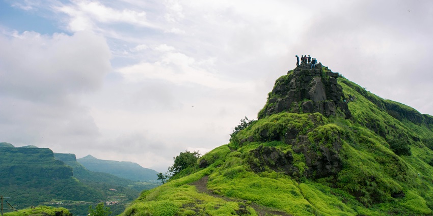 The beautiful Ganesh Darwaja at Ratangad Fort, highlighting its historic stonework and surroundings