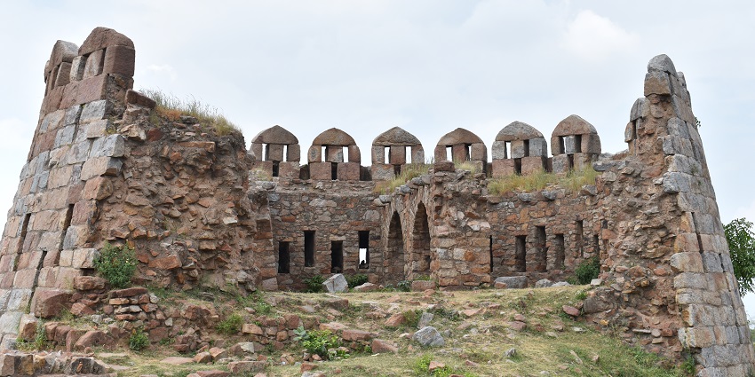 Wide angle view of the fort building, with intricate architectural charm