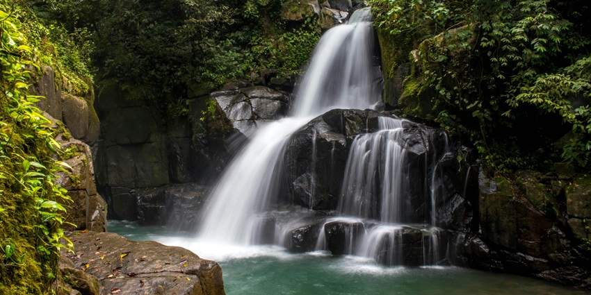 Enchanting view of Sengupathi waterfalls in Coimbatore, surrounded by lush greenery