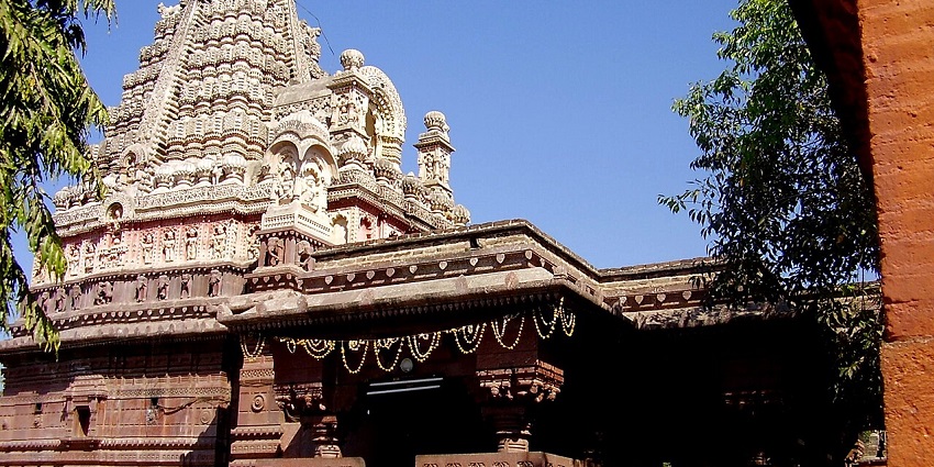 View of the intricately carved temple top of Tuljapur Temple