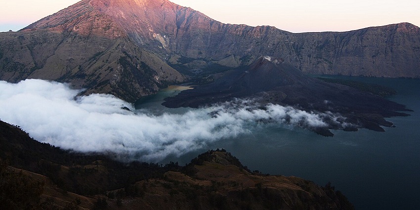 A beautiful sunset view captured from the centre of Mount Rinjani ft. clouds