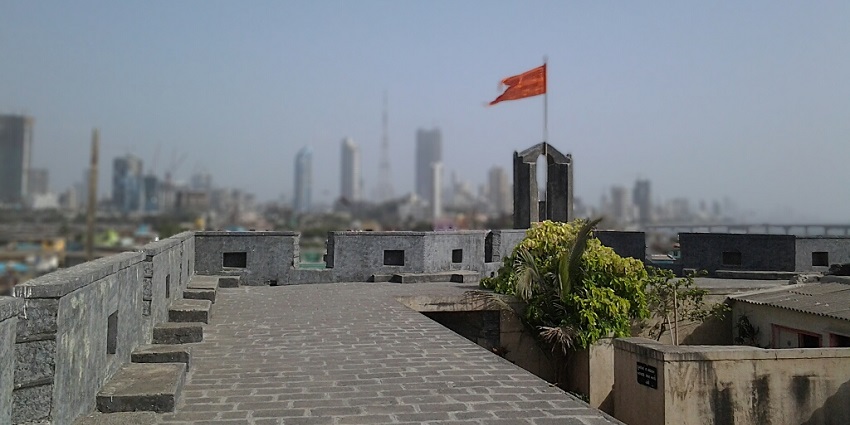 Worli Fort Haunted Well, showcasing the eerie structure surrounded by greenery
