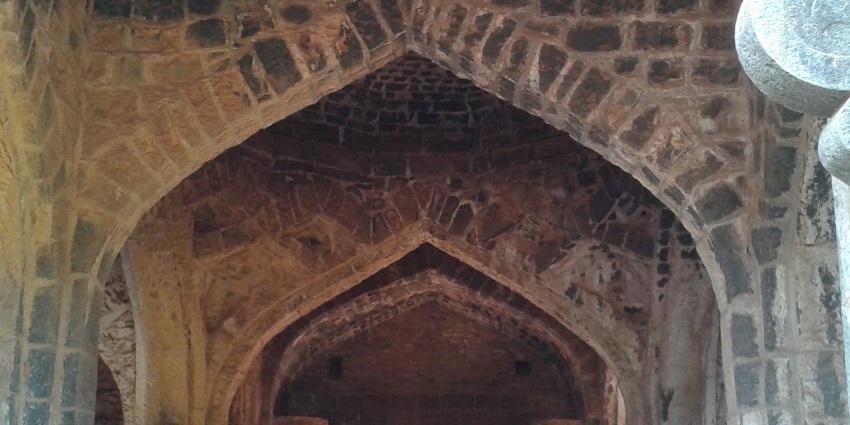 Image of the arched entrance of the Fort, showcasing the historic architecture.
