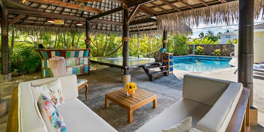 A cosy cabana beside a swimming pool, offering a relaxing retreat near Chandoli National Park.