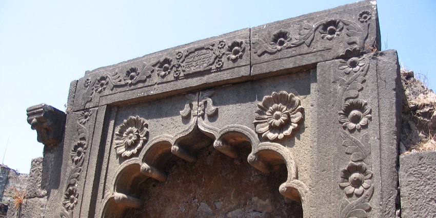 Entrance of Padmagad Fort, which is surrounded by calm coastal waters.