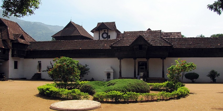 Majestic wooden palace showcasing traditional Kerala architecture and heritage.