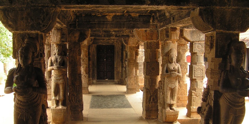Pillars of Padmanabhapuram Palace with beautiful structures carved on them.