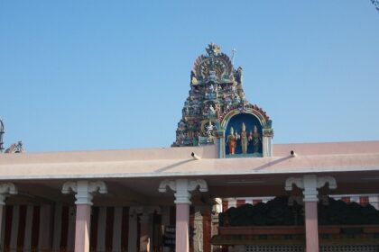 View of the Palani Temple, showcasing its impressive architecture against a clear sky