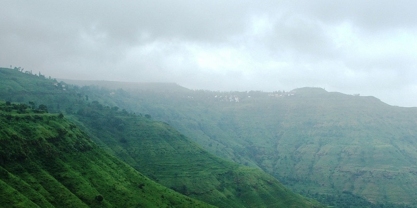 Misty valley view of hills from table land in Panchgani during August rains in Maharashtra in August