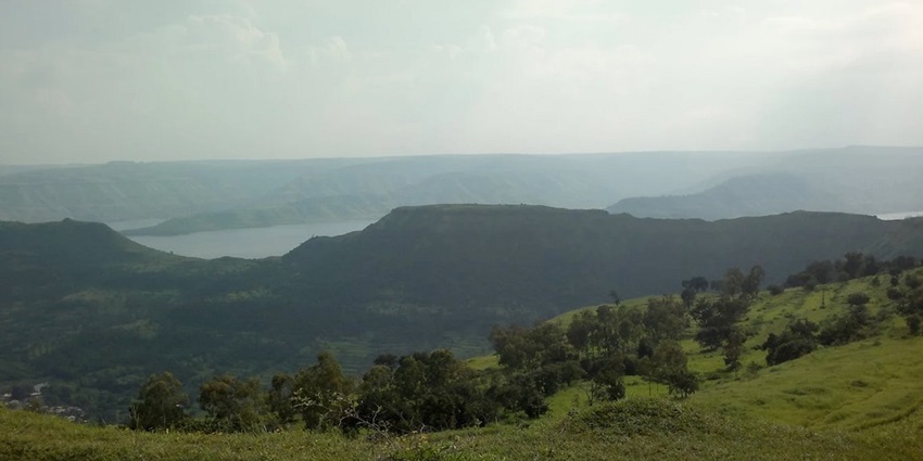 Fog blankets the lush hills of Panchgani creating a serene and picturesque landscape