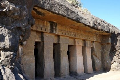 An exterior view of Pandav Leni Caves showcasing intricate rock-cut architecture.