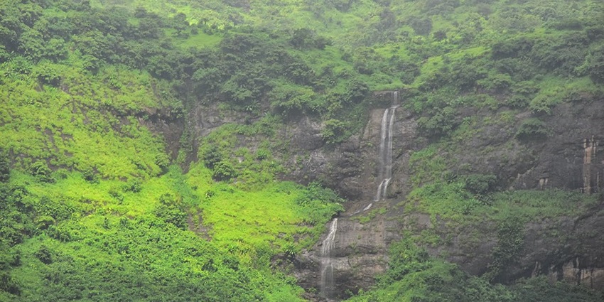 Pandavkada Waterfalls is a romantic spot with cascading waters and tranquility.