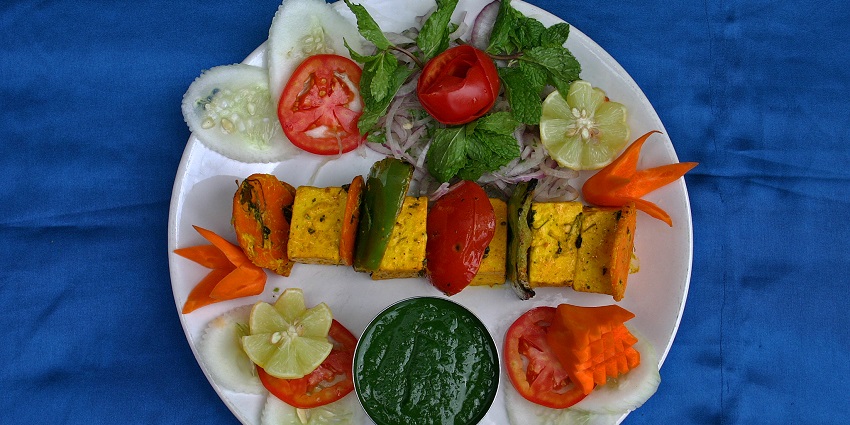Snapshot of the barbequed Paneer with the tomatoes, Onions and the Capsicum