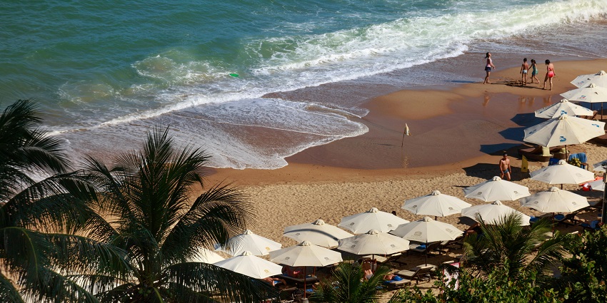 Paradise Beach Club, the beach club featuring crystal-clear waters and lounging.