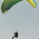 Ooty offers thrilling paragliding experiences amidst scenic hill landscapes