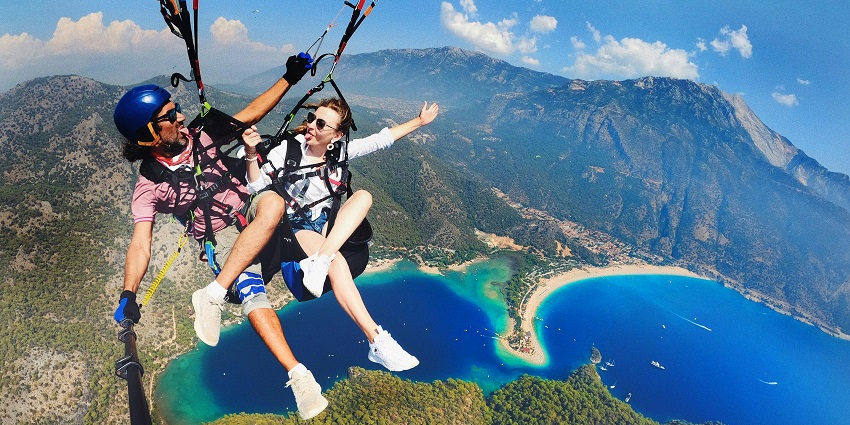 A picture of a couple of paragliding, one of the best Chivla Beach Sea Water Sports