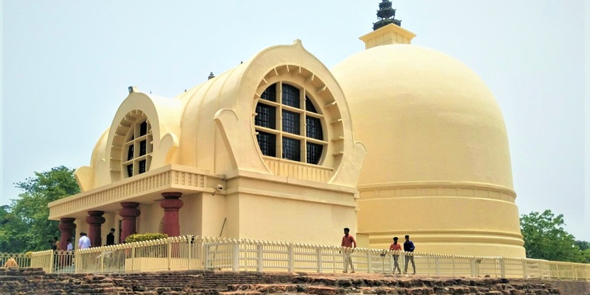 Kushinagar’s Parinirvana Stupa with reclining Buddha statue marks the sacred site of Gautama Buddha’s final nirvana, located near Blue Lagoon Water Park.
