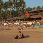 Beautiful view of people relaxing on Anjuna beach, North Goa for a buzzing time