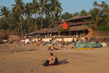 Beautiful view of people relaxing on Anjuna beach, North Goa for a buzzing time