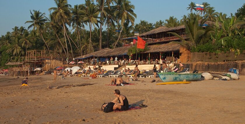 Beautiful view of people relaxing on Anjuna beach, North Goa for a buzzing time