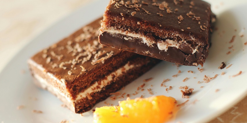 Famous food in Kodaikanal bakery features fresh pastries, cakes, and snacks.