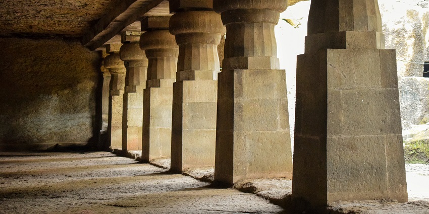 view of the serene halls of the cave temple, a must visit attraction near the Chaturshringi temple