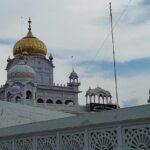 A glimpse of a pristine white gurudwara in Punjan exuding serenity and tranquillity.