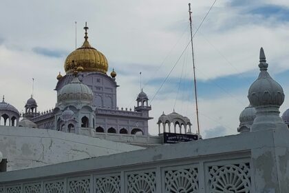 A glimpse of a pristine white gurudwara in Punjan exuding serenity and tranquillity.