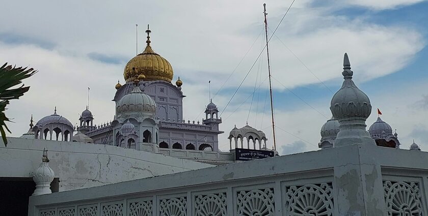 A glimpse of a pristine white gurudwara in Punjan exuding serenity and tranquillity.