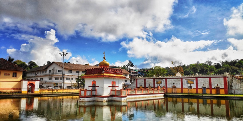 Majestic landscape of the Omkareshwara Temple exudes a serene aura in the Western Ghats