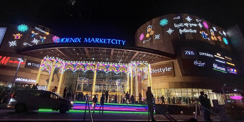 Experience the vibrant illuminated facade of Phoenix Market City in Viman Nagar!