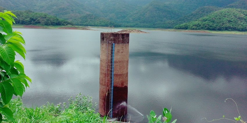 Scenic reservoir, lush surroundings, tranquil atmosphere, recreational haven.