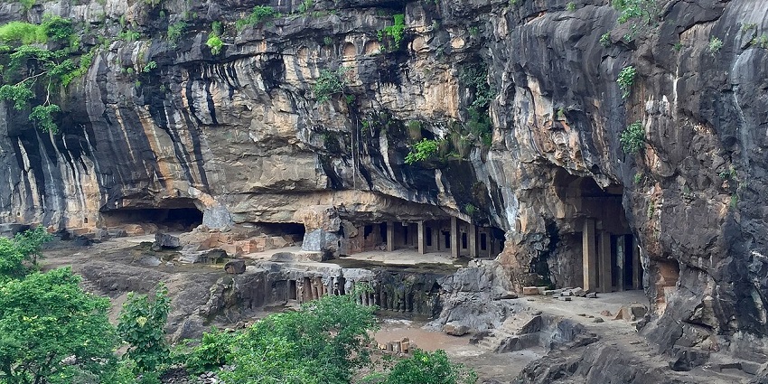View of the Pitalkhora Caves surrounded by greenery, one of the places to visit near Grishneshwar temple.
