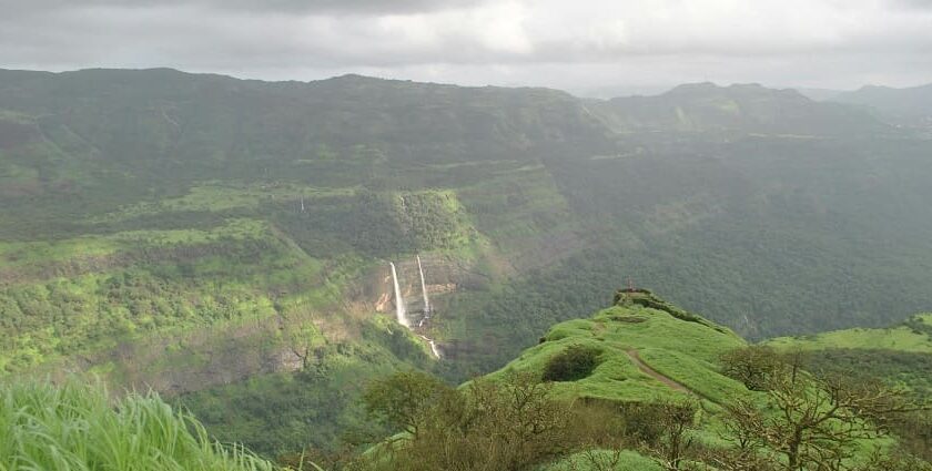 A view of mist-covered hills, among some of the best places near Pune for weekend.