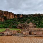 Intricately carved caves revealing ancient spiritual artistry.