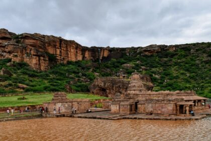 Intricately carved caves revealing ancient spiritual artistry.