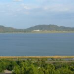 A panoramic view of Chengalpattu showcasing temples, shopping areas, and natural beauty