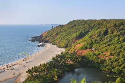 A bird’s eye view of the pristine golden sands, glistening waters and tall palm trees.