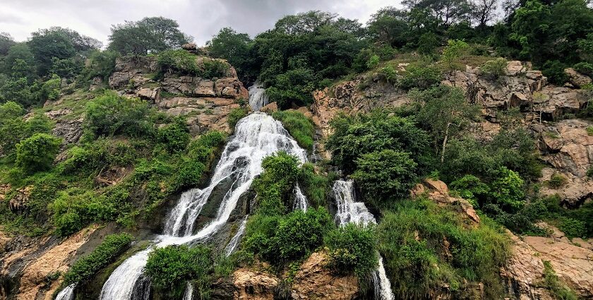 A stunning view of a waterfall, showcasing its intricate architecture and vibrant colours.