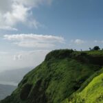 A glimpse of the majestic peaks adorned with lush greenery vegetation in Maharashtra.