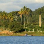 A picture of Yelagiri Lake, which is surrounded by lush greenery and mountains.