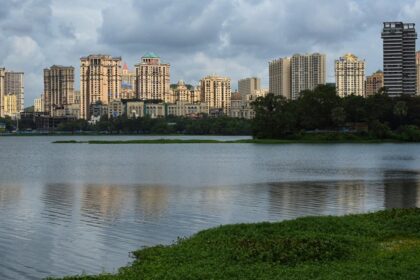 A serene picture of Borivali East, showcasing shops, buildings, and bustling urban life.