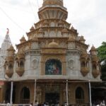 A serene view of Dagdusheth Ganpati Temple in Pune, showcasing its stunning architecture.