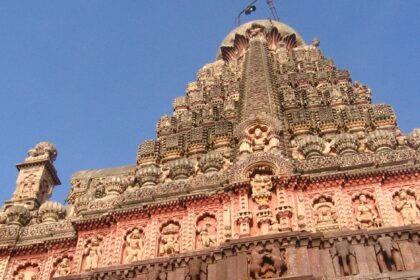 An image of the Grishneshwar Temple, surrounded by lush greenery and historical landmarks.