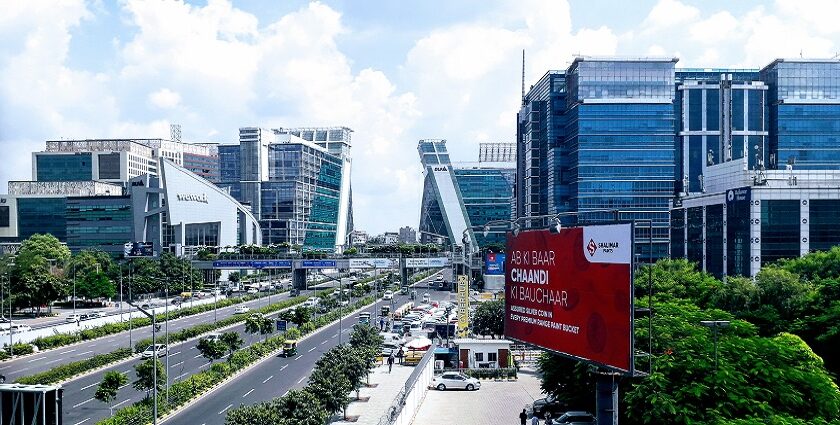 Image of Gurugram cyber city with stunning architecture and busy road during day time