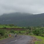 View of the Kalsubai peak from a road passing by, one of the best places to visit in Igatpuri