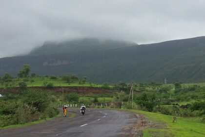 View of the Kalsubai peak from a road passing by, one of the best places to visit in Igatpuri