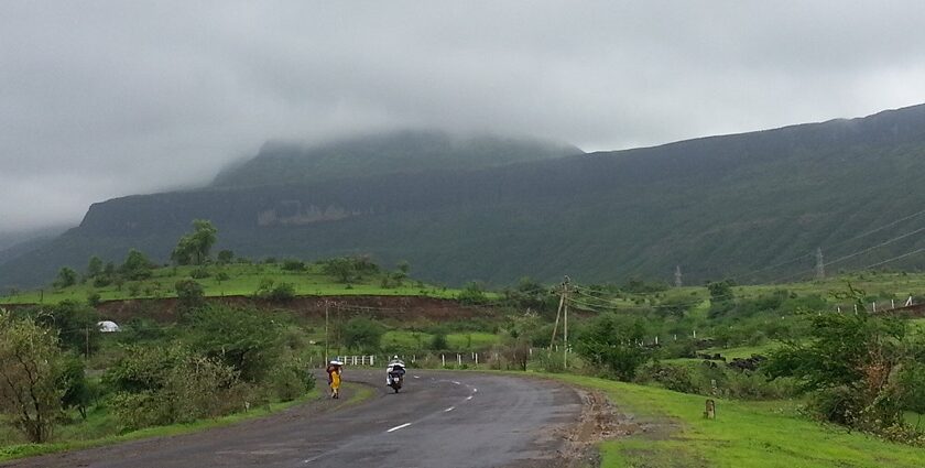 View of the Kalsubai peak from a road passing by, one of the best places to visit in Igatpuri